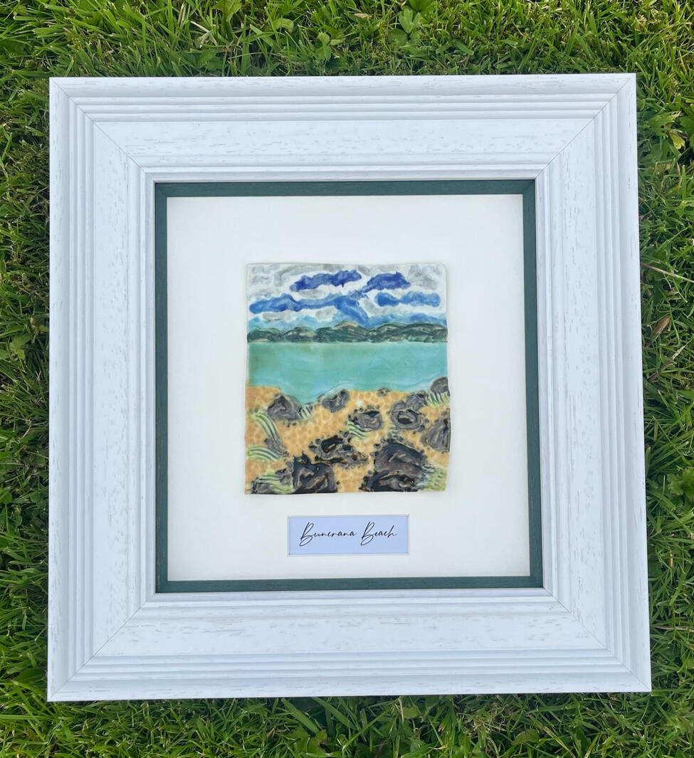 A hand-crafted framed pottery display